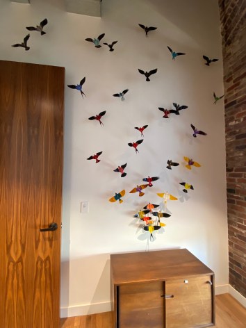 Like the site-specific, recycled aluminum can butterflies, Paul Villinski's LP Vinyl Record Bird Series is also available by commission. Making this work even more bespoke, even profoundly personal, the client chooses the individual records they would like to use as the material for sculptures. Selecting from one's own favorite singers, musicians, and albums, the resulting installation tells the story of the music which inspires the client musically . . . but now also visually.,  