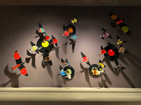 Like the site-specific, recycled aluminum can butterflies, Paul Villinski's LP Vinyl Record Bird Series is also available by commission. Making this work even more bespoke, even profoundly personal, the client chooses the individual records they would like to use as the material for sculptures. Selecting from one's own favorite singers, musicians, and albums, the resulting installation tells the story of the music which inspires the client musically . . . but now also visually.,  