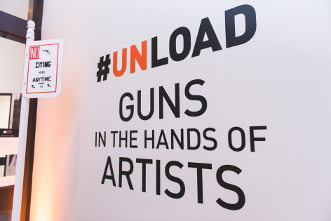 Installation View of #UNLOAD: Guns in the Hands of Artists, The Fairfield University Art Museum
