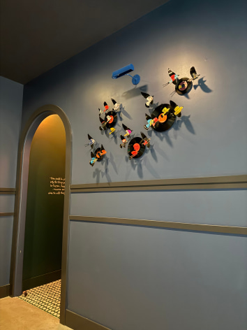 Like the site-specific, recycled aluminum can butterflies, Paul Villinski's LP Vinyl Record Bird Series is also available by commission. Making this work even more bespoke, even profoundly personal, the client chooses the individual records they would like to use as the material for sculptures. Selecting from one's own favorite singers, musicians, and albums, the resulting installation tells the story of the music which inspires the client musically . . . but now also visually.,  