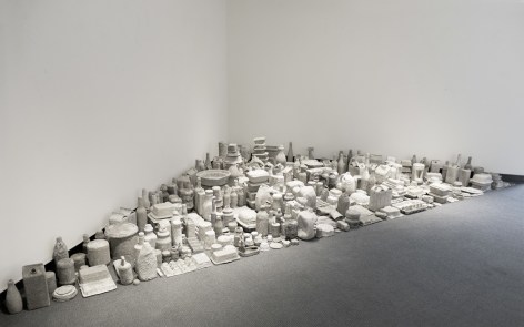 Erin Woodbrey  Cities in Dust (Corner Piece), 2022  Found objects encased in wood ash,&nbsp;plaster, and gauze  5.1 x 5.1 x 4.5 m / 17 ft x 17 ft x 15 ft
