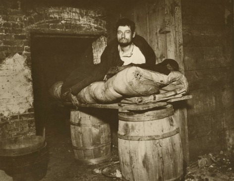 Jacob Riis - One of Four Pedlars Who Slept in the Cellar of 11 Ludlow Street Rear, New York, c.1890 - Howard Greenberg Gallery