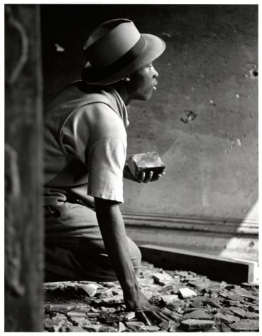 Gang Member with Brick, 1948 Gelatin silver print 14 x 11 inches