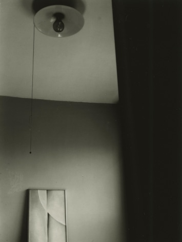Dorothy Norman - Georgia O'Keefe Painting with Light Bulb, c. 1936 - Howard Greenberg Gallery