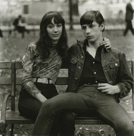 Diane Arbus  Young couple on a bench in Washington Square Park, N.Y.C., c.1965  Gelatin silver print; printed 1965  14 3/8 x 14 3/8 inches  From an edition of 75
