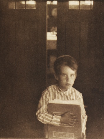 Clarence White - Boy with Camera Work, 1905 - Howard Greenberg Gallery