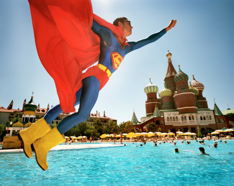 Reiner Riedler, Fake Holidays, Man in Superman costume above Red Square, Antalya, Turkey, 2006, Sous Les Etoiles Gallery