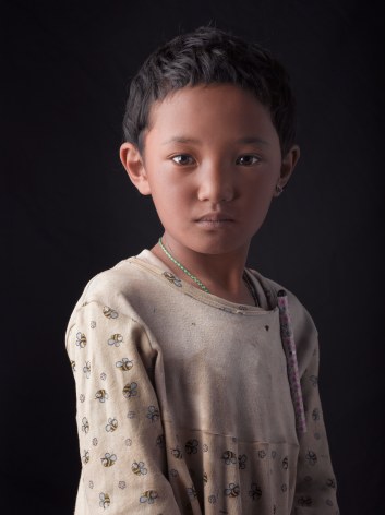David Zimmerman, One Voice, Portrait of young girl Nyiki Dolma with pen, 2012, Sous Les Etoiles Gallery