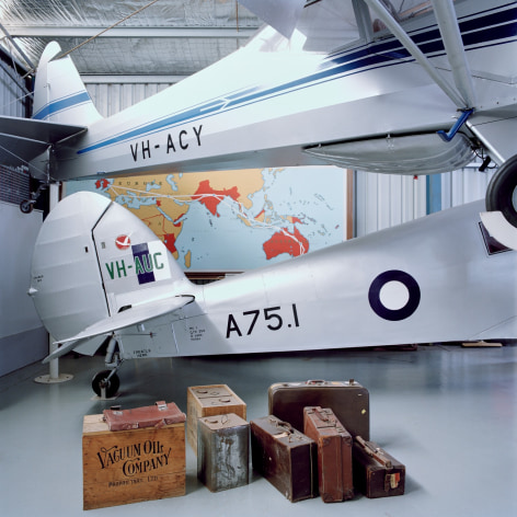 Interior of an airplane hanger with vintage planes