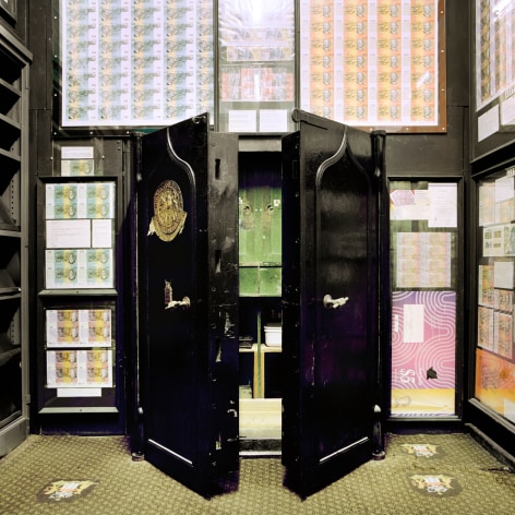 Interior of an antique bank vault with large amounts of Australian currency on display