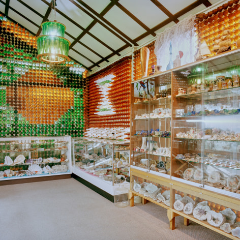 Color photo of the interior of a glass and bottle museum