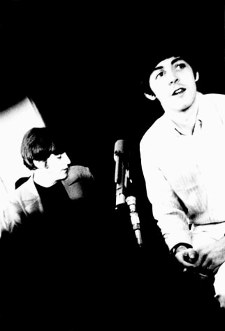 Black and white image from a Beatles press conference in 1966. Shot of Paul Mccartney.