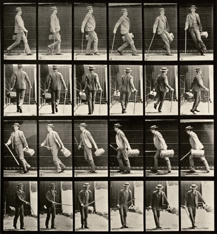 Sequential series of black and white photos showing a man in a hat walking and turning around rapidly, a satchel in one hand, cane in other