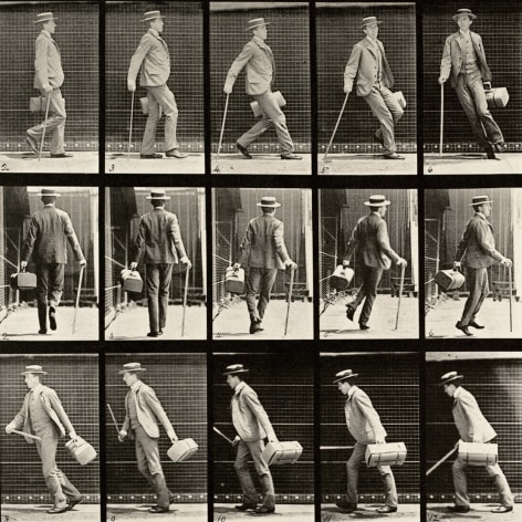 Sequence of black and white photos showing the movements of a man in a suit and a hat, carrying a cane and and a case, as he walks and turns around.