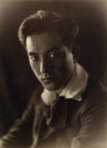 Black and white portrait of Japanese American silent film star Sessue Hayakawa, he looks at the camera, circa 1920.