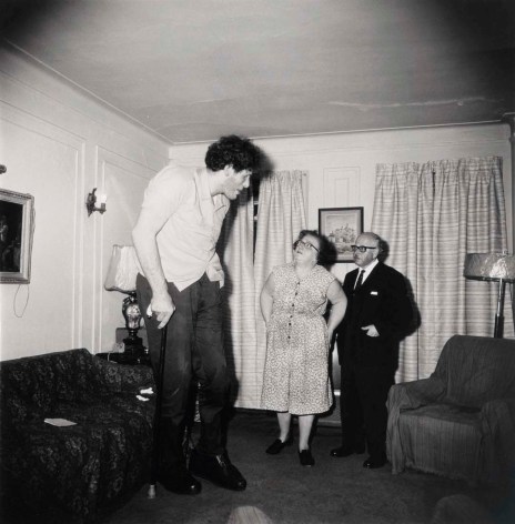 Diane Arbus, A Jewish giant at home with his parents, in the Bronx, N.Y., 1970