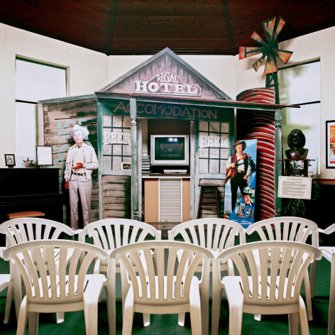 Interior showing plastic charis at a small country ansd western musuem