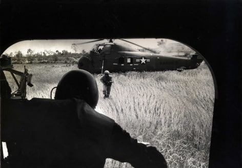 Yankee Papa 13: From the downed sister helicopter, Yankee Papa 3, its wounded gunner, Sergeant Billie Owens dashes to Yankee Papa 13, 1965