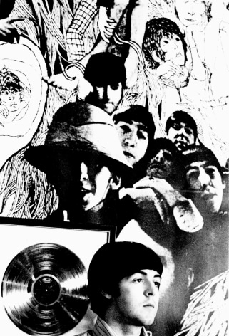 Black and white image from a Beatles press conference in 1966. Paul MCarteny in front of enlargement of Revolver album art and a framed gold record.