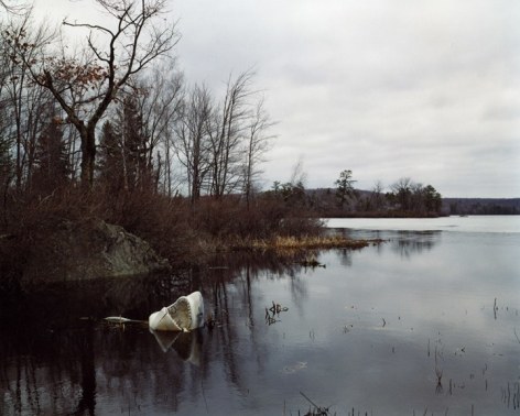 Plastic shark in lake behind sports bar, Pocono Mountains, Pennsylvania, 2005. Archival Pigment Print, Editions of 5. Available Sizes: 24 x 20 inches, 40 x 30 inches, and 50 x 40 inches