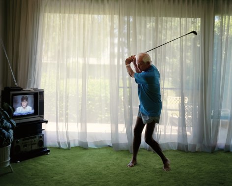 Practicing Golf Swing, from the series Pictures from Home, 1986. Archival pigment print,&nbsp;40 x 50 inches.&nbsp;Please inquire for additional sizes.