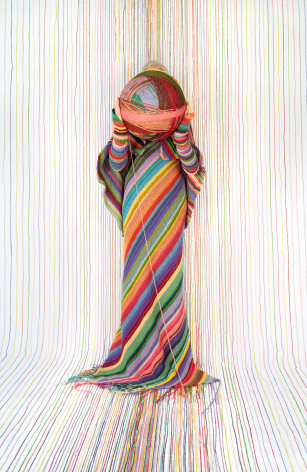 Rachel Perry,&nbsp;Lost in My Life (Needlepoint Holding Yarn Ball), 2023. Archival pigment print, 60 x 40 inches.