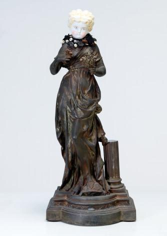Karin Broker Pedestal girl, 2022 cast metal, porcelain, buttons, wire, steel base 22 x 9.25 x 7 inches