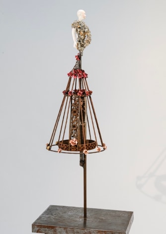 Karin Broker Pirouette girl, 2022 shotgun, porcelain, steel, rhinestones, wire, metal, steel base 54 1/2 x 16 x 16 inches