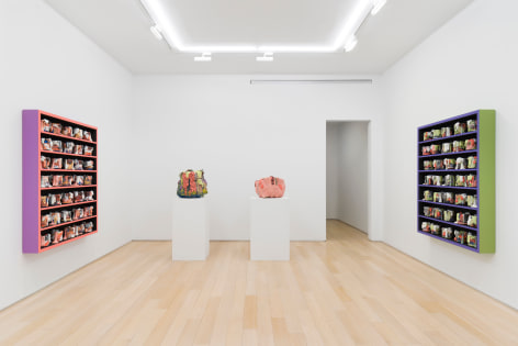 installation view with ceramic vessels