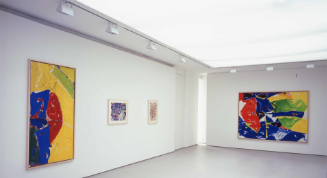 installation view of two large paintings and a small drawing in a large gallery