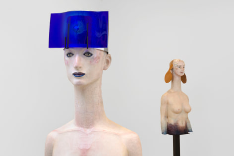 installation view of figurative sculptures
