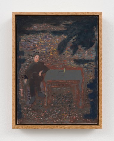 man sitting at a table