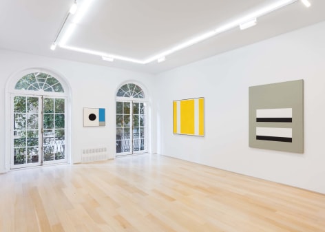 installation view of three abstract paintings