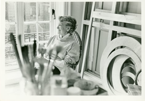 woman sitting in her studio