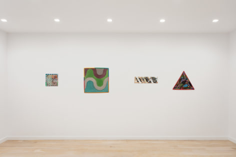 Installation view with multiple Alan Shields paintings