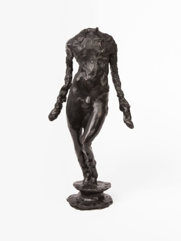 headless bronze statuette