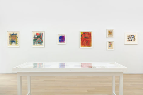 installation view with framed drawings