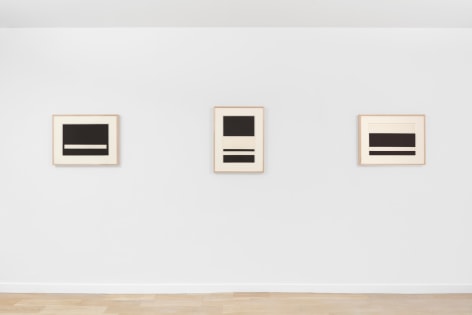 installation view of geometric abstract prints