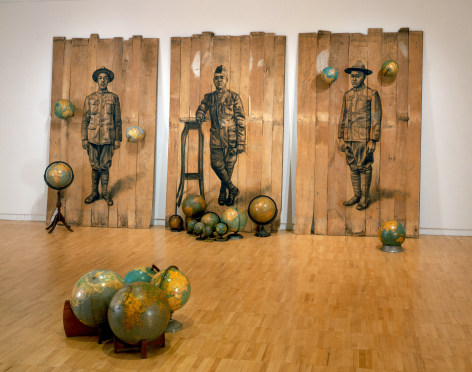 Whitfield Lovell, Autour Du Monde, 2008. Cont&eacute; on wood panels with globes. 102 x 189 x 171 inches