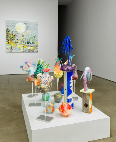 Installation view of Melanie Daniel's solo exhibition, featuring paintings and sculptures