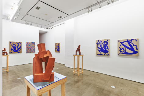 Installation view of works by Todd Kelly. The exhibition features paintings and sculptures.