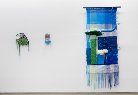 Installation view of &quot;Adriadne Unraveling&quot;. Three textile works are hung on the wall.