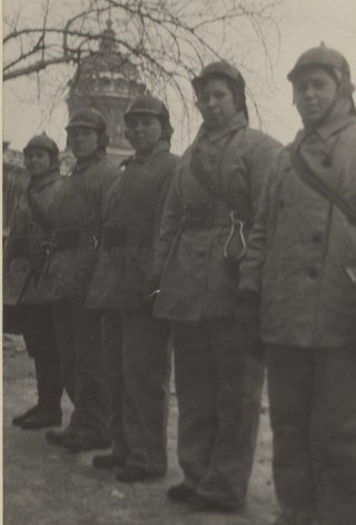 Many Leningrad girls have joined the volunteer fire fighter brigades. They successfully combat fires caused by enemy shells and fire-bombs