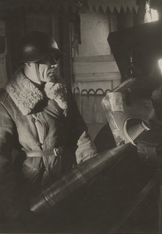 Guards gunner loading a shell