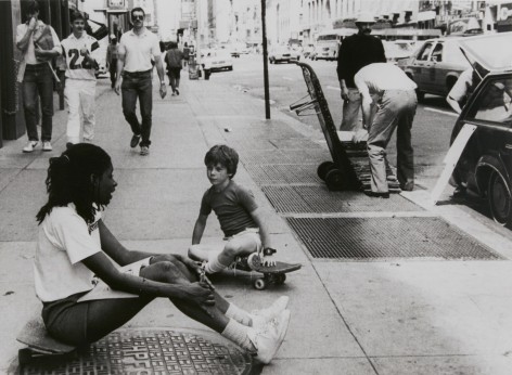 Rudy Burckhardt Untitled, New York (girl and young boy seated on skateboard in middle of sidewalk), c. 1985