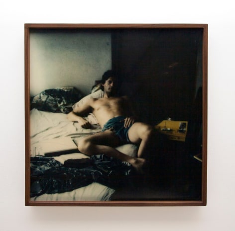 Michel Auder, Self portrait open legged on bed
