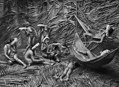 Women in the Zo&rsquo;&eacute; village of Towari Ypy color their bodies with the red fruit of the urucum,&nbsp;Par&aacute;, Brazil, 2009, gelatin silver print, 24 x 35 inches/61 x 89 cm