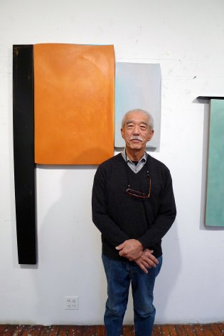 Artist Robert Yasuda in his studio