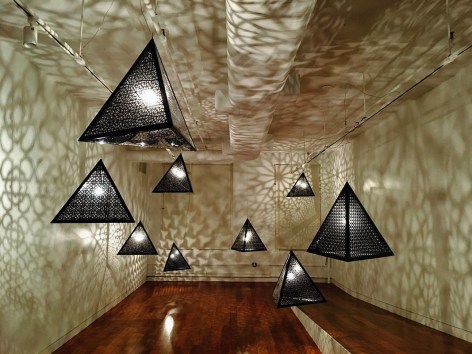 Alhambra Nights, 2016, laser-cut lacquered steel and light bulb, 9 tetrahedrons