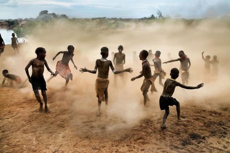, Steve McCurry, Children of the Hamer Tribe playing in Dus Village, Omo Valley, Ethiopia, 2012, ultrachrome print, 30 x 40 inches/76.2 x 101.6 cm; &copy; Steve McCurry
